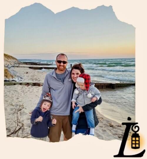 Dan and Jen Hinderer and their sons at the beach on an outing away from Lamplighter B&B of Ludington