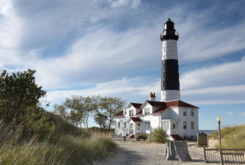 Big Sable Lighthouse with clouds in the sky