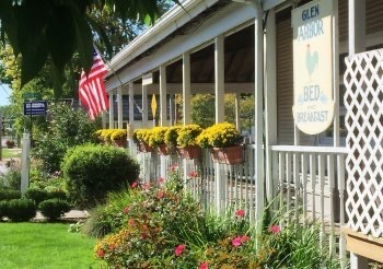 Glen Arbor Bed & Breakfast with Condos -front porch with flowers