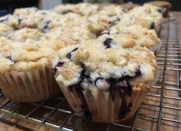 Blueberry muffins on a cooling rack