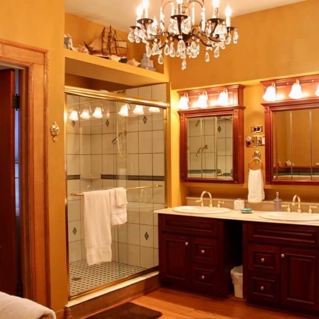 Myer-Rosa Suite at Himelhoch B&B in Caro has a bathroom with a large heated-tile shower, double sinks and a chandelier. Located in the Thumb it’s among Michigan inns you need to try.