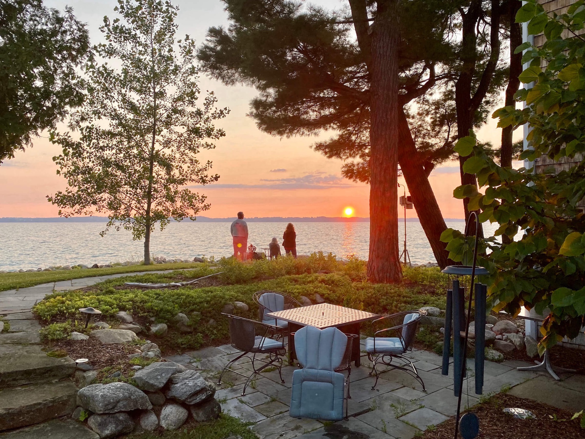 Guests of Spring Lighthouse B&B view sunset over Mission Peninsula