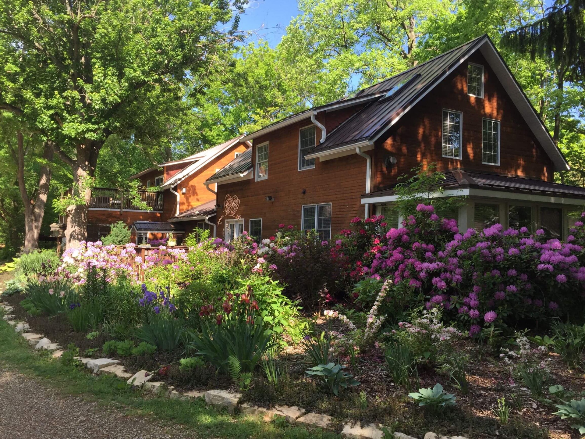 Goldberry Woods B&B exterior with gardens