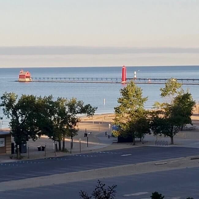 View of lighthouses in Grand Haven from the patio of Looking Glass B&B, a Michigan Bed and Breakfasts