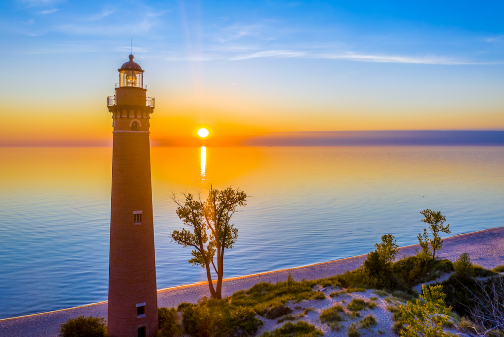 Little Sable Lighthouse with the sun setting behind