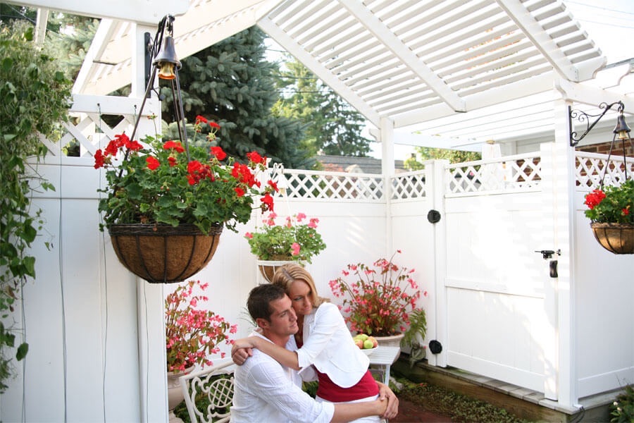 Couple in Pergola at the Prairieside Suites B&B