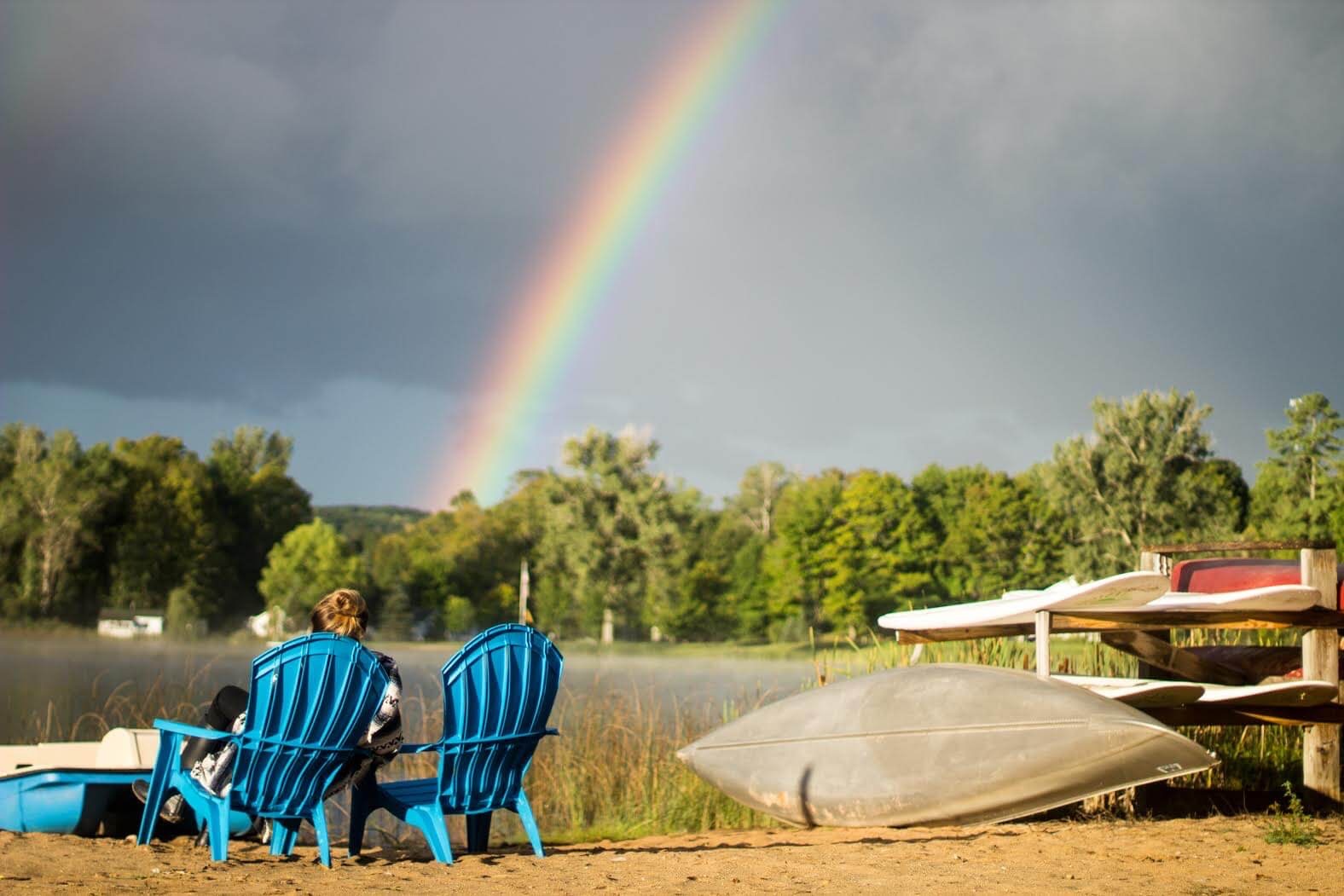 Rainbow and two Adirondack chairs at House on the Hill B&B