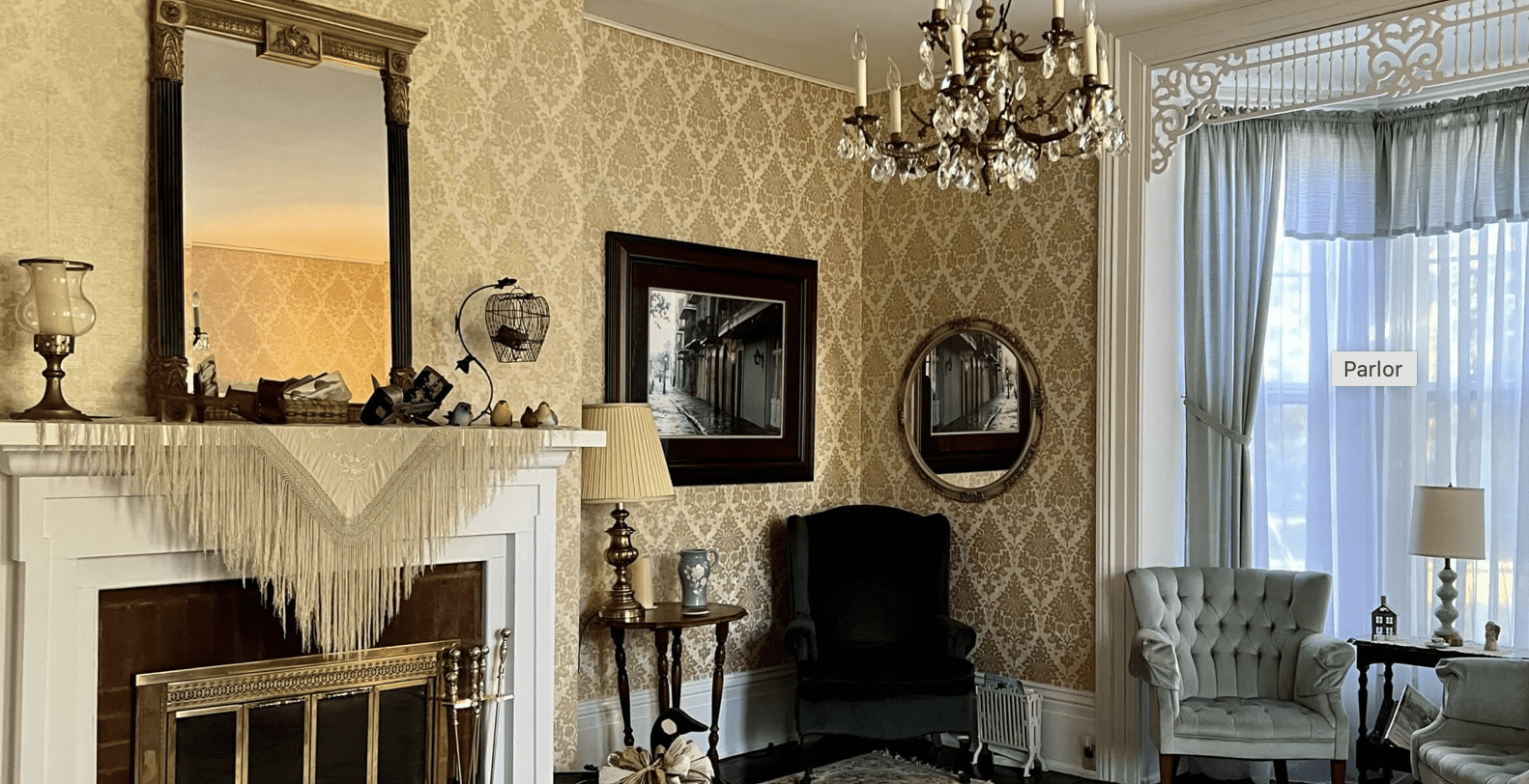 Mirror over a fireplace at the Raymond's House Inn