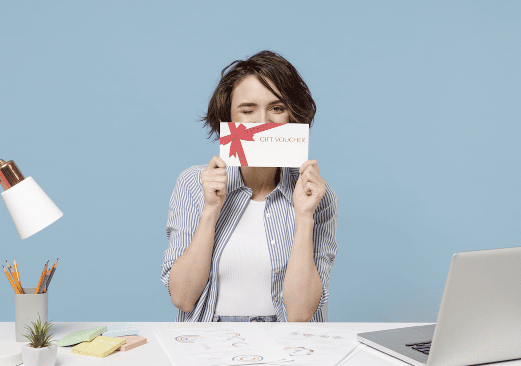 Office worker receiving a gift card