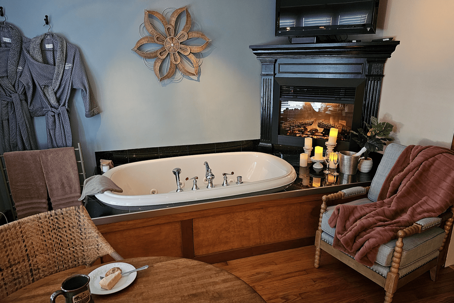 Whirlpool tub with a fireplace at the Prairieside Suites B&B