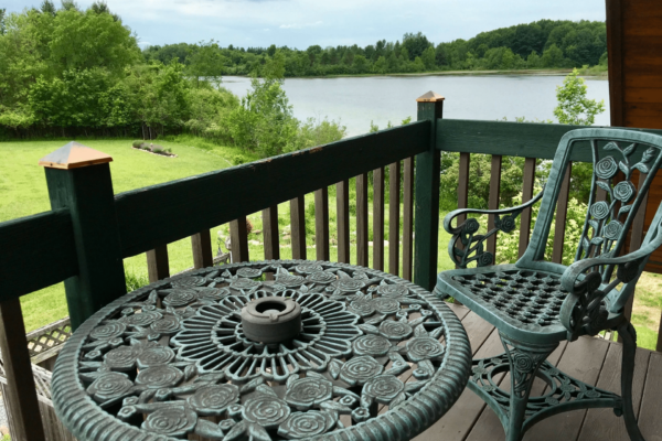 Metal Settee on a balcony at A Dove Nest B&B