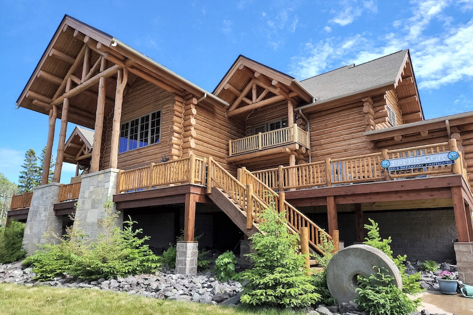 Dapple Gray in Michigans upper penisula, imposing view of log cabin bed and breakfast building