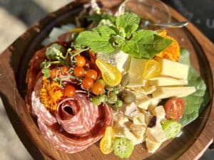 Charcuterie Board with a salami flower from Goldberry Woods