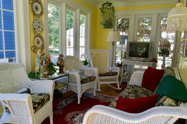 Wicker furniture on a porch at the Dutch Colonial Inn in Holland