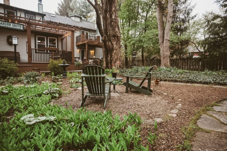 Adirondack chairs in front of the Garden Grove Inn