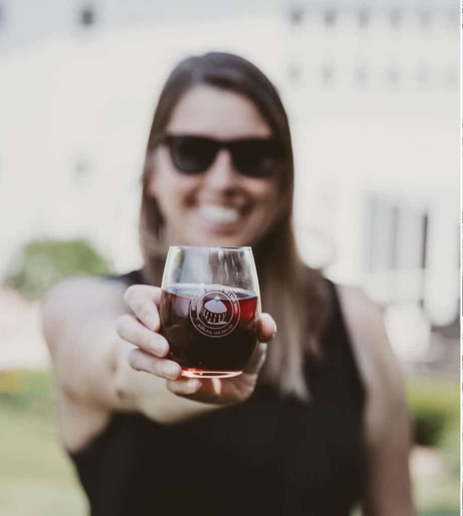 Woman holding a glass of wine