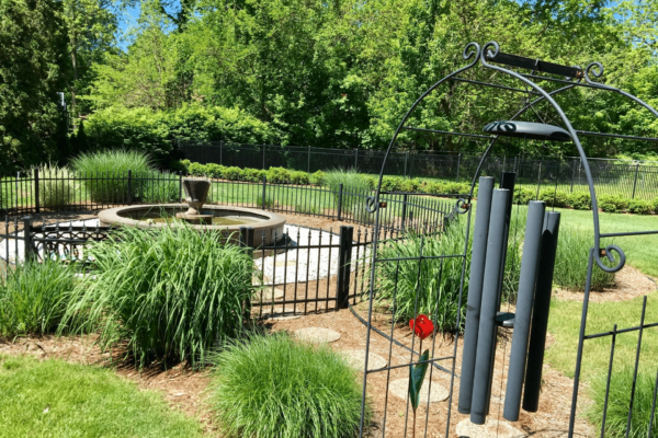 Gardens with a wind chime at the Inn at Old Orchard Road