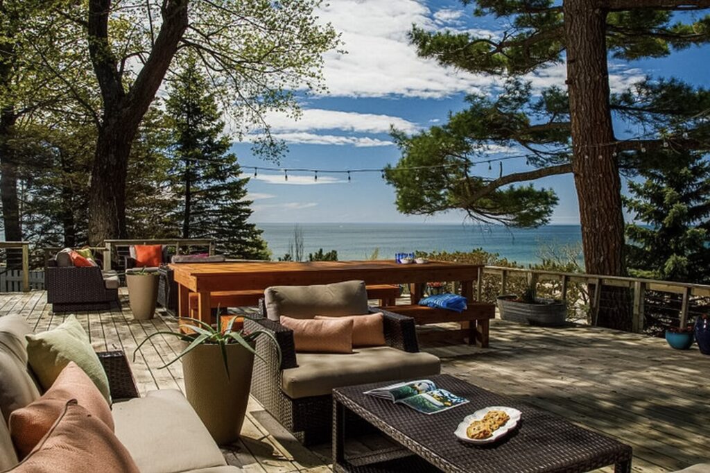 Porch overlooking Lake Michigan at the Looking Glass Beach Front Inn